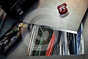 Through the technical hatch visible network wires