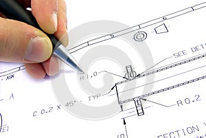 Technical sketch with hand and pen.