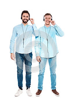 Technical support operators with headsets on white