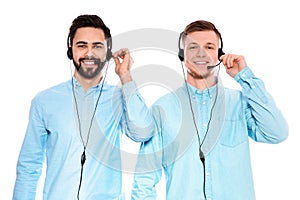 Technical support operators with headsets on white