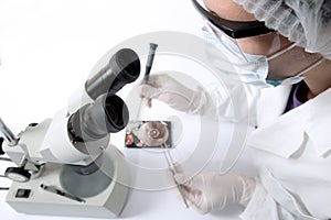 Technical surgeon working on hard drive - data recovery
