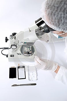 Technical surgeon working on hard drive - data recovery