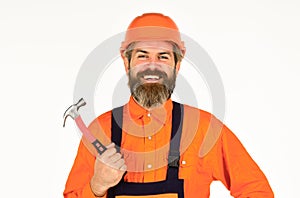 Technical work. Bearded mature man in uniform. Guy with hammer. Good hammer. Almost every household has hammer. Estimate