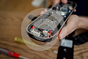 A technician assembles and installs smart electronic door lock for house protection