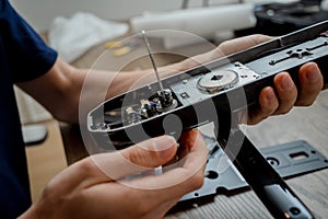 A technician assembles and installs smart electronic door lock for house protection