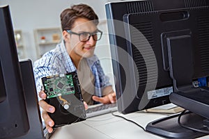 The technician with broken hard drive