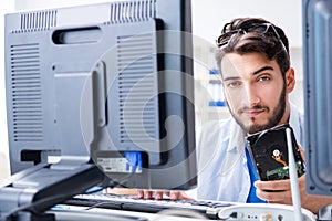 The technician with broken hard drive