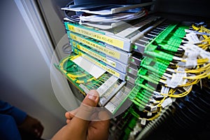 Technician checking routers