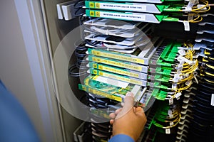 Technician checking routers