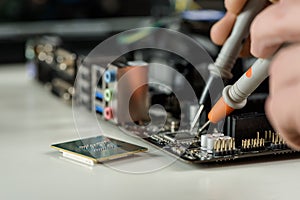 A technician checks the serviceability of the computer