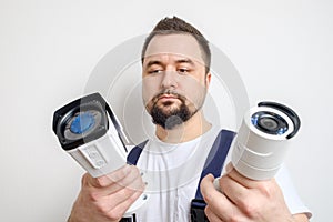 Technician choosing CCTV security camera