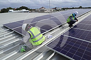 Technician Connecting Cable of Solar Rooftop