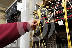 Technician connecting fibre optic