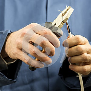 Technician or electrician working with wiring