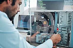 It technician, engineer and computer hardware with a man working to fix or maintenance technology. Hands of expert IT