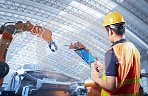 Technician or engineer work with robot