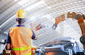 Technician or engineer work with robot