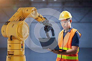 Technician or engineer work with robot