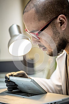 Technician fixing computer hardware