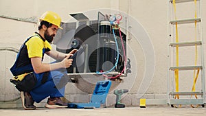 Technician fixing refrigerant issues