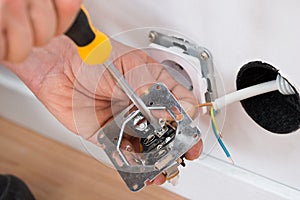 Technician fixing socket
