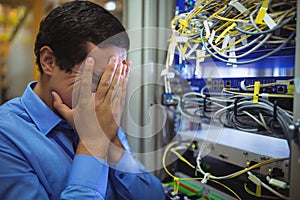 Technician getting stressed over server maintenance