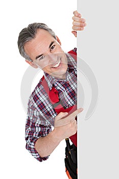 Technician Holding Blank Placard