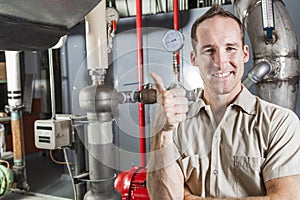 Technician inspecting heating system in boiler