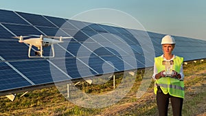 Technician and investor Using Infrared Drone Technology to Inspect Solar Panels and Wind Turbines in Solar cell Farm