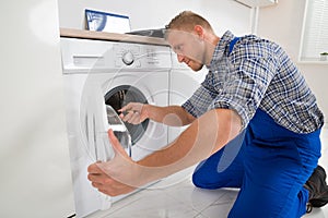 Technician Making Washing Machine