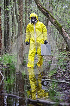 Technician in professional uniform in floods area