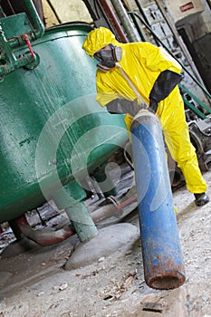 Technician in protective uniform, mask,gloves deal