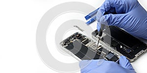 Technician repairing the Cell phone parts and tools for recovery repair smartphone