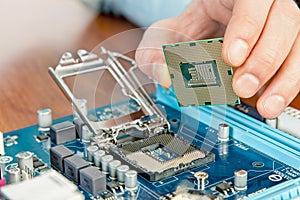 Technician repairing computer hardware in the lab