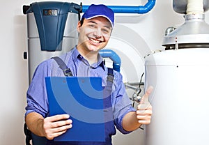 Technician servicing an hot-water heater