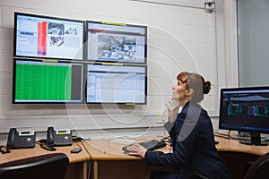 Technician sitting in office running diagnostics
