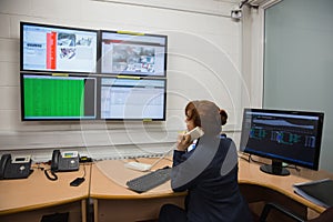 Technician sitting in office running diagnostics