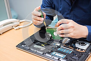 Technician support upgrade part and fixing laptop. select focus, Computer repair concept