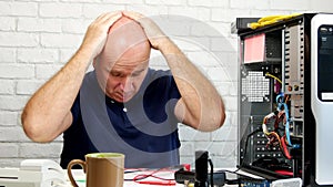 Technician Try to Fix a Computer and Gesticulate Disappointed