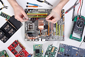 Technician upgrade of computer top view, motherboard