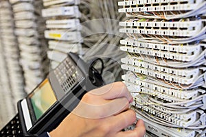 Technician using digital cable analyzer