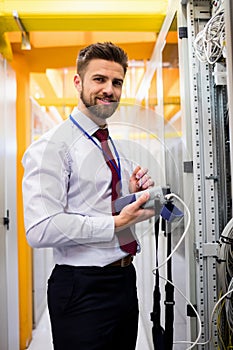 Technician using digital cable analyzer
