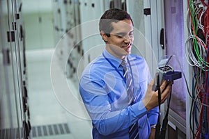 Technician using digital cable analyzer