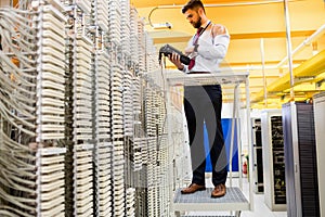 Technician using digital cable analyzer
