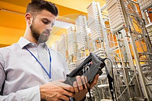 Technician using digital cable analyzer