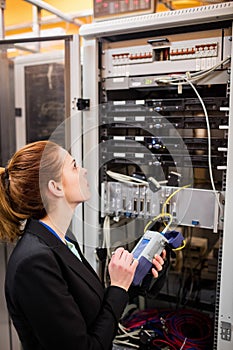 Technician using digital cable analyzer