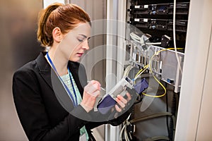 Technician using digital cable analyzer