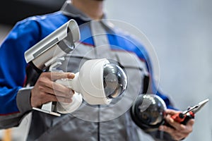 Technician Using Surveillance Security Camera Video