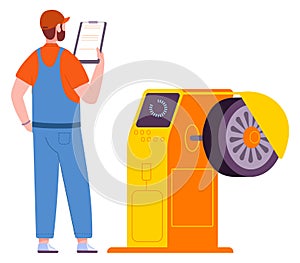 Technician work with tyre. Auto repair service scene