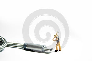 Technician worker figure standing in front of usb USB type C cable. IT support concept